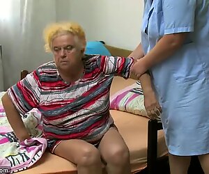 Mature woman using dildo on chubby granny