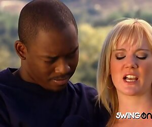 Experienced swingers play games in the garden