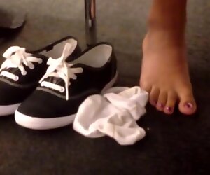 Candid sexy indian feet socks off at library