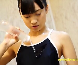 Skinny Japanese doll rubs her pussy and cums